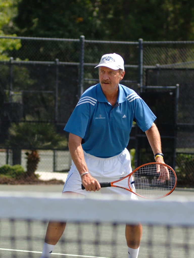 Stan Smith playing tennis 