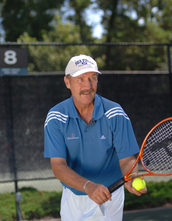 Stan Smith playing tennis 