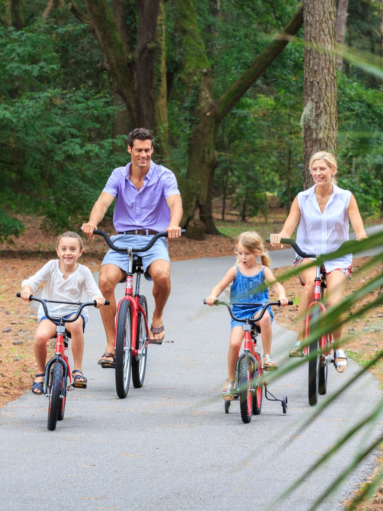 Family biking on a path 