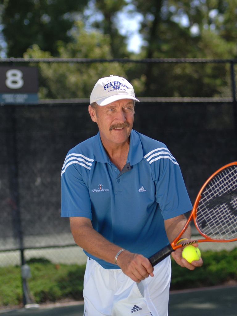 Stan Smith playing tennis 