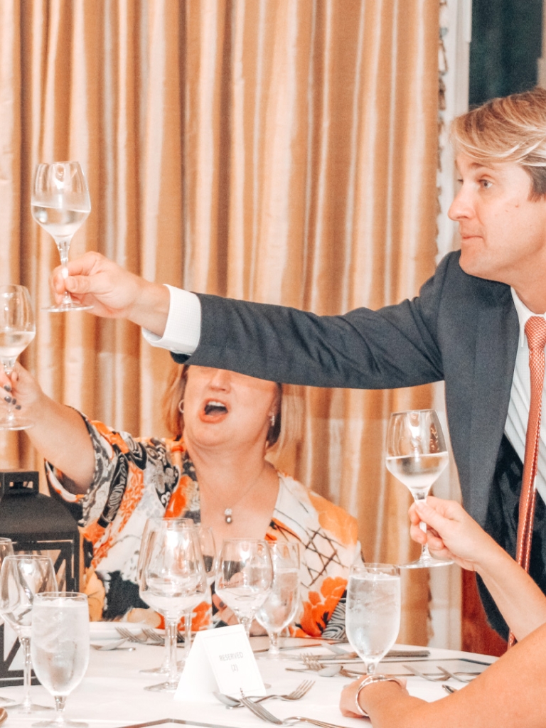 guests attending a wine dinner 