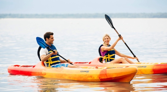 A couple kayaking 